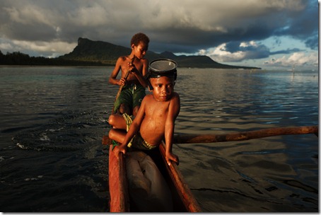 children in a canoe-lagoon-Rah Lava-Banks-Vanuatu